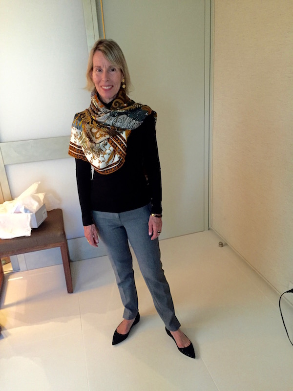 classifies grey slacks, black turtleneck 