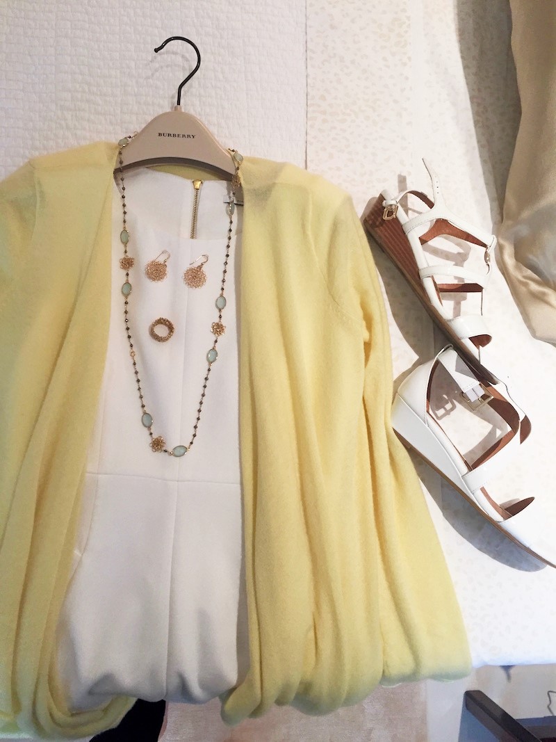 diane von furstenberg white sleeveless dress, yellow cashmere cardigan, gold drop earrings, gold band ring, gold light crystal necklace, soft white patent leather low wedge sandals, soft low cork wedge sandals