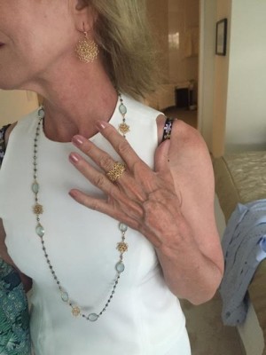 gold drop earrings, gold ring, gold crystal beaded necklace