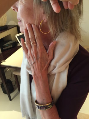 gold hoop earrings, gold crossover ring, gold and multi-color bangle