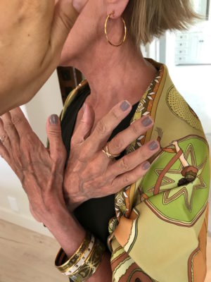 gold hoop earrings, gold crossover ring