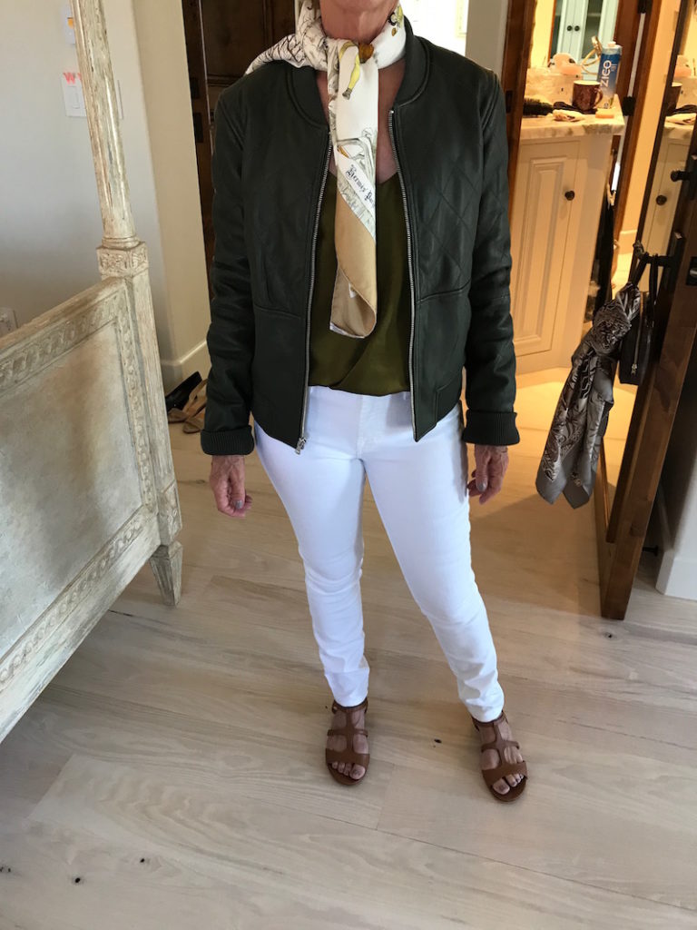 philip lim green sleeveless blouse, 7 for all mankind white jeans, white denim, dark green leather jacket, uniqlo dark green jacket, white printed scarf, j.crew tan sandals