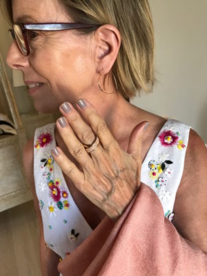 gold and crystal crossover ring, gold dangle earrings