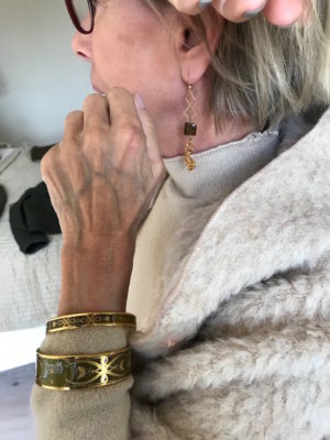 gold and brown stone drop earrings, gold and green bangles