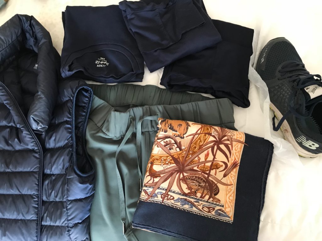lululemon green joggers, j.crew navy blue round neck top, uniqlo navy blue turtleneck, uniqlo navy blue long sleeve top, uniqlo navy blue zip up vest, navy blue multi-color print scarf, new balance navy blue sneakers