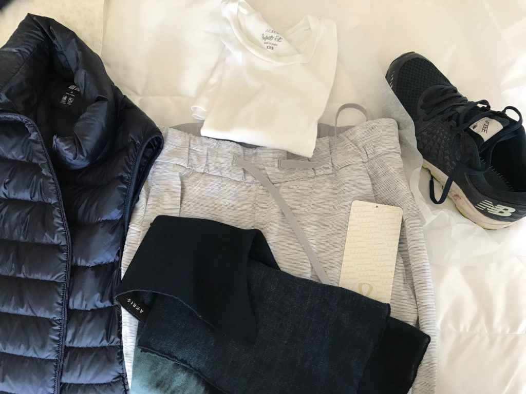 j.crew white round neck top, uniqlo navy blue zip up vest, new balance navy blue sneakers, navy blue scarf, uniqlo grey stripped joggers