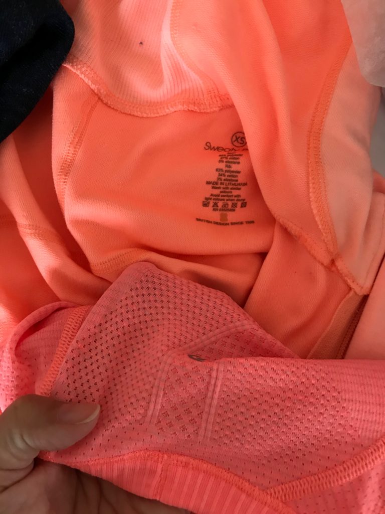lululemon hot pink top, sweaty betty pink zip up hooded jacket