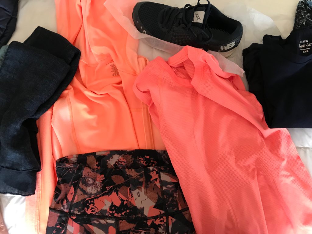 lululemon hot pink top, sweaty betty pink zip up hooded jacket, navy bleu scarf, lululemon navy blue and pink printed leggings, new balance navy blue sneakers, j.crew navy blue round neck top