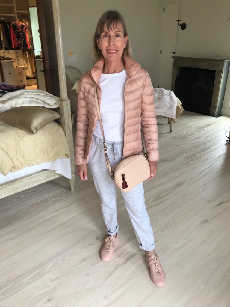 white crew neck t-shirt, light grey joggers, uniqlo pink puffer jacket, beige sneakers, j.crew nude crossbody bag
