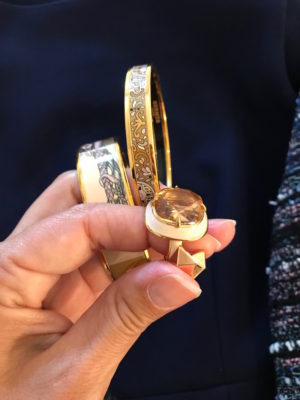 gold bangles, large stone ring, gold pyramid stud earrings