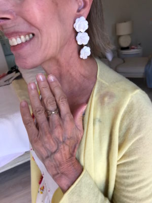 white flower drop earrings, gold crossover ring