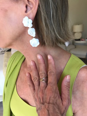 white flower drop earrings, gold crossover ring