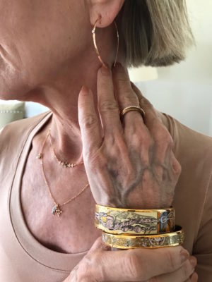 rose gold and crystal bar earrings, rose gold and crystal crossover ring, gold bangles, rose gold layered charm necklace