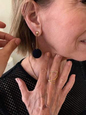 gold abstract ring, gold chain necklace, gold and navy blue bauble earrings