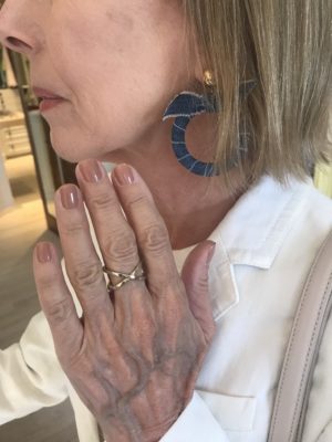 gold crossover ring, blue ribbon hoop earrings