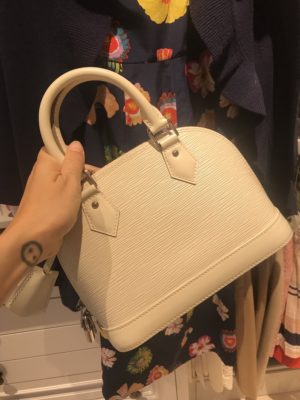 nude handbag