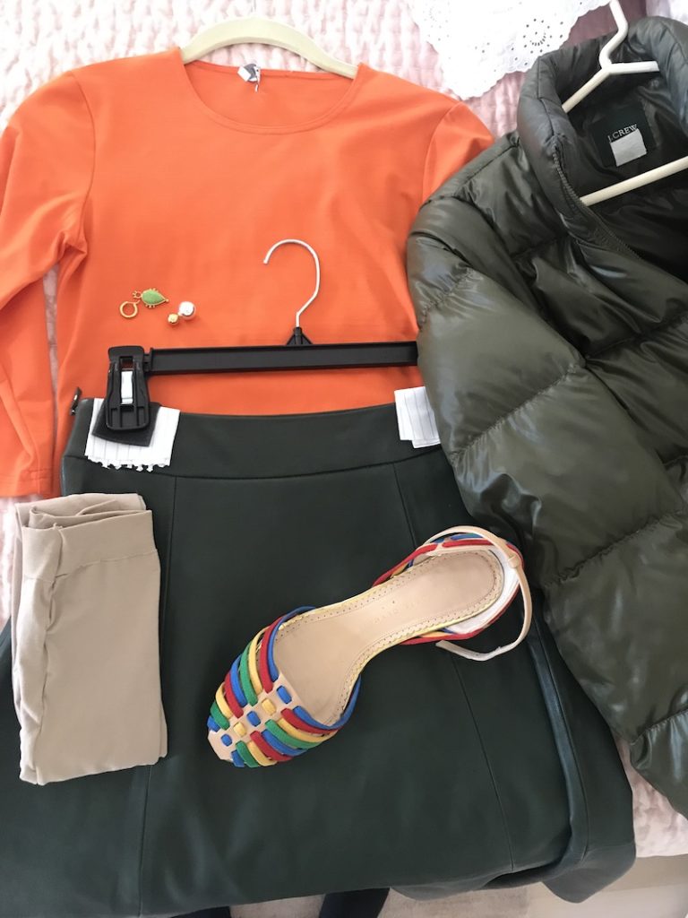 Worth orange long sleeve shirt, Kate Spade olive green leather skirt, J. Crew olive green puffer jacket, Charlotte Olympia mulit color heels, nude leggings, green gemstone drop earrings, mixed metal ball earrings