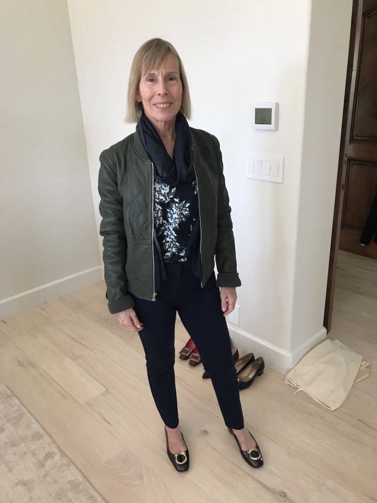black and blue floral top, Kobi Halperin navy blue pants, Paige olive green leather jacket, dark grey scarf, navy blue and gold flats