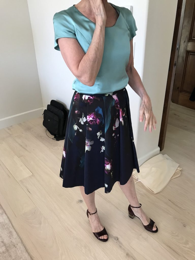 baby blue short sleeve blouse, Ted Baker multi-colored floral skirt, burgundy open toe heels